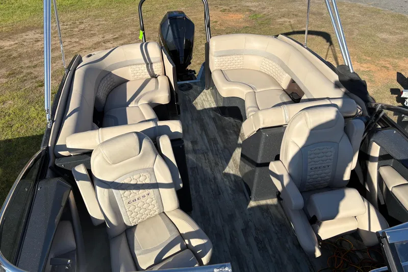 Slide: The Image of Luxurious interior of 2022 Crest Continental 250 pontoon boat with plush seating. - 5