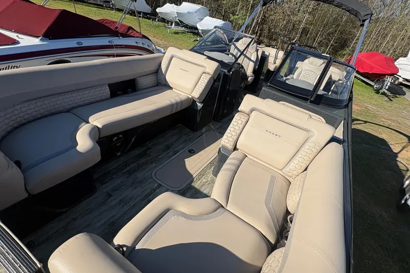 Slide: The Image of Luxurious interior of 2022 Crest Continental 250 boat with beige seating and modern design. - 6