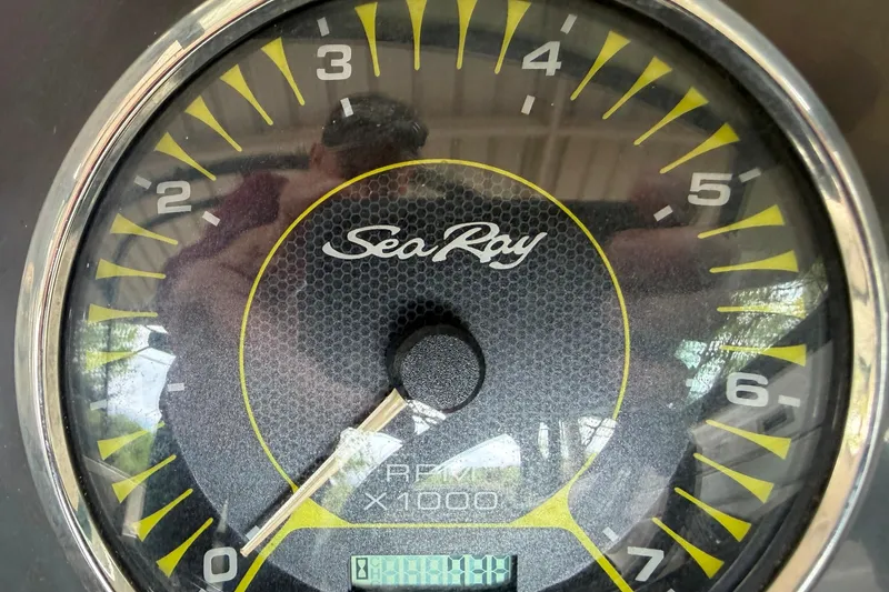 Slide: The Image of Close-up of a Sea Ray SPX 190 tachometer, displaying RPM readings. - 16