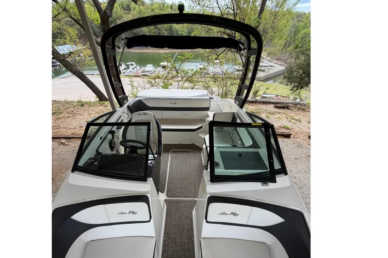 Slide: The Image of 2017 Sea Ray SPX 190 boat interior with open cockpit and lake view. - 7