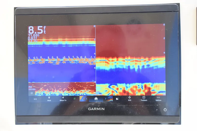 Slide: The Image of Garmin fishfinder display on 2017 Scout 275 Dorado, showing depth and temperature readings. - 13