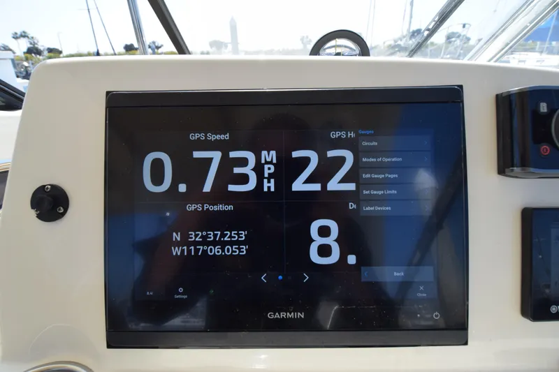 Slide: The Image of Garmin GPS display on 2017 Scout 275 Dorado showing speed and coordinates. - 15