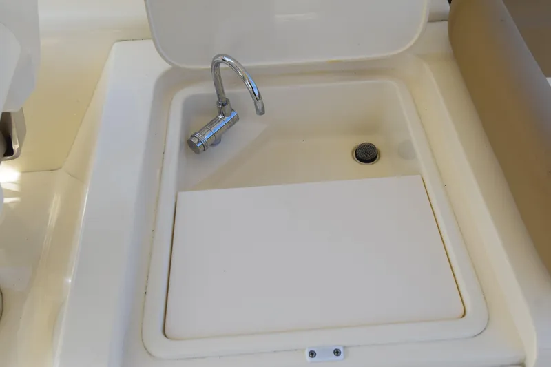 Slide: The Image of 2017 Scout 275 Dorado boat sink with faucet and drain. - 16