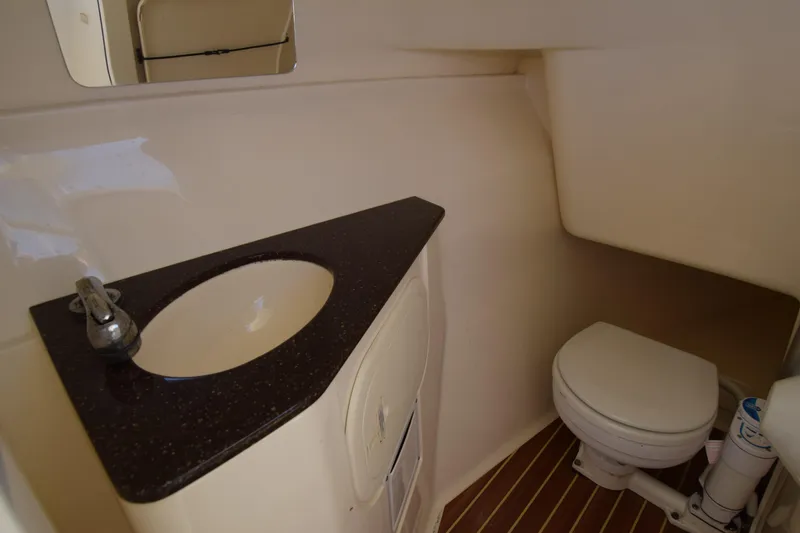 Slide: The Image of 2017 Scout 275 Dorado boat bathroom with sink and toilet. - 22