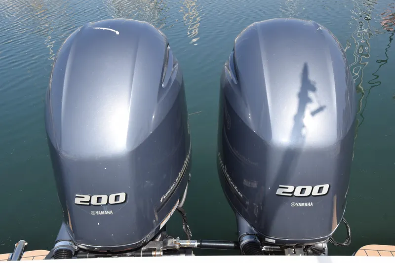 Slide: The Image of Twin Yamaha 200 outboard engines on a 2017 Scout 275 Dorado boat. - 25