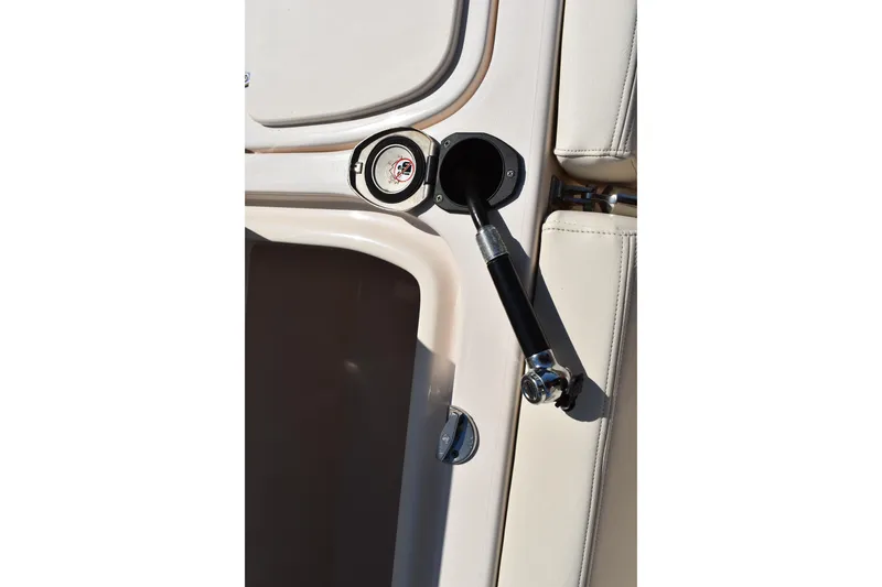 Slide: The Image of Open storage compartment on 2017 Grady-White Fisherman 257 boat, showcasing interior space. - 10