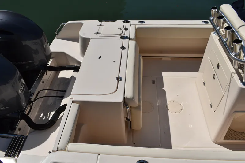 Slide: The Image of Fuel cap and hose on 2017 Grady-White Fisherman 257 boat deck. - 11