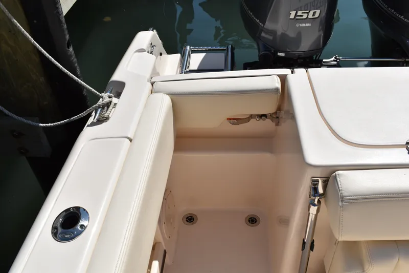 Slide: The Image of Livewell compartment on a 2017 Grady-White Fisherman 257 boat, open and empty. - 12