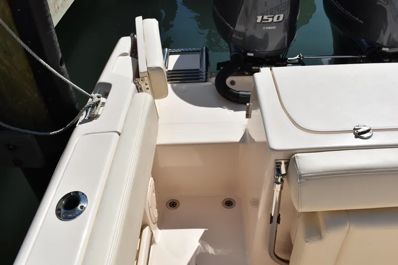 Slide: The Image of 2017 Grady-White Fisherman 257 boat seat, white upholstery, stainless steel frame. - 13