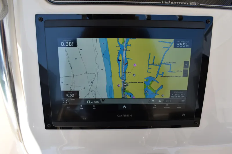 Slide: The Image of Storage compartment on a 2017 Grady-White Fisherman 257 boat, featuring a secure latch. - 15
