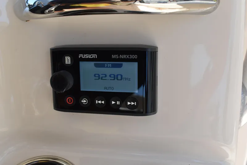 Slide: The Image of 2017 Grady-White Fisherman 257 boat seating with dual Yamaha 150 engines in background. - 27