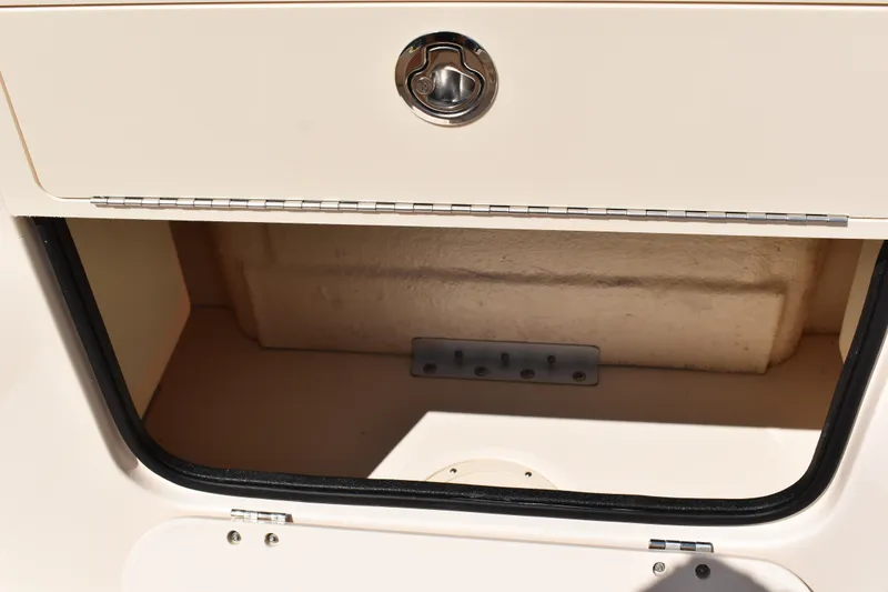 Slide: The Image of 2017 Grady-White Fisherman 257 boat interior with open storage compartment. - 29