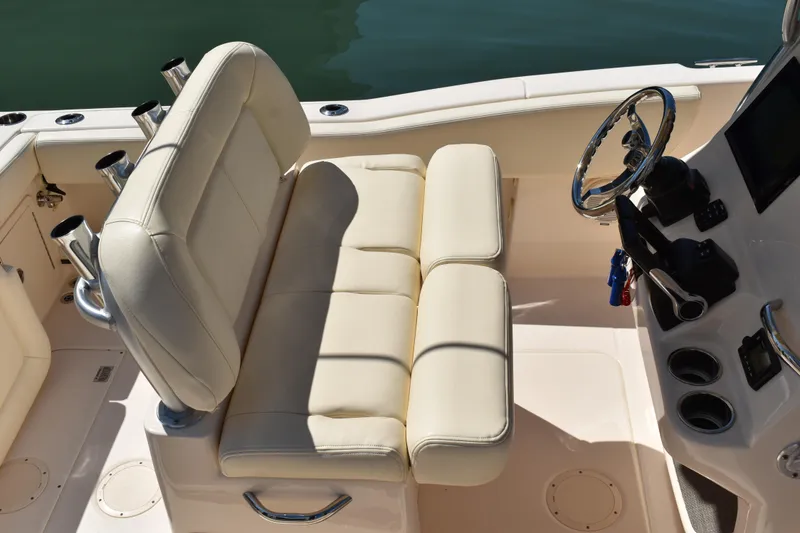 Slide: The Image of 2017 Grady-White Fisherman 257 cabin interior with bunk beds and storage space. - 31