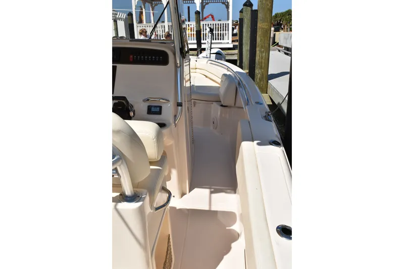 Slide: The Image of 2017 Grady-White Fisherman 257 boat interior with white cushioned seating. - 34