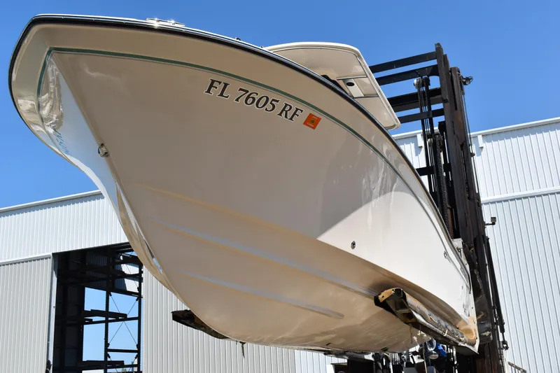 Slide: The Image of 2017 Grady-White Fisherman 257 boat storage compartment open, showing interior space. - 37