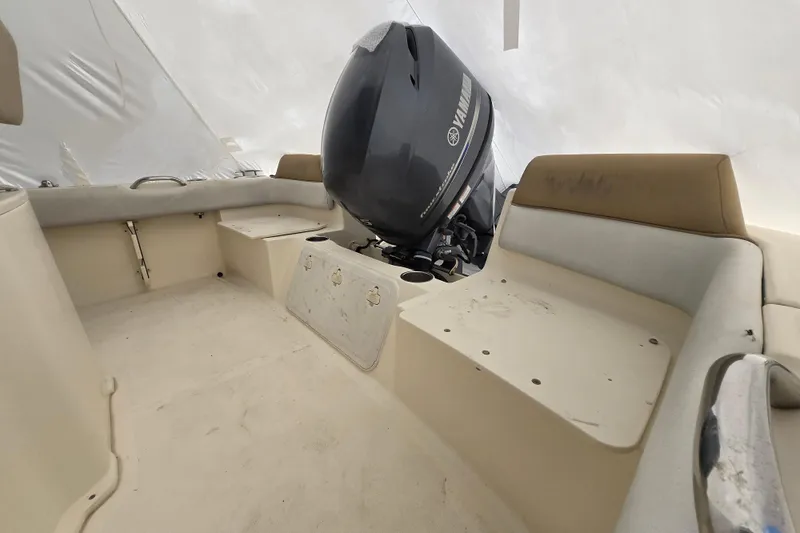 Slide: The Image of 2015 Scout 195 Sportfish boat interior with Yamaha outboard motor. - 16