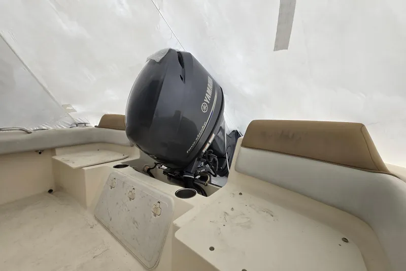 Slide: The Image of 2015 Scout 195 Sportfish boat interior with Yamaha outboard motor. - 18