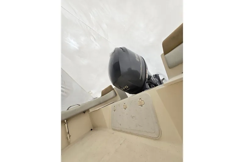 Slide: The Image of 2015 Scout 195 Sportfish boat with Yamaha outboard motor, interior view. - 19