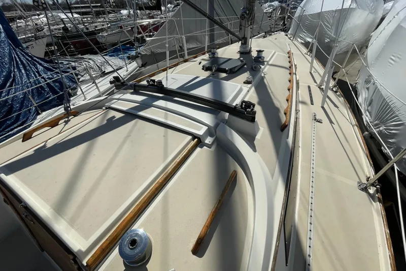 Slide: The Image of 1982 O'Day 34 sailboat cockpit with blue cover and winches. - 12