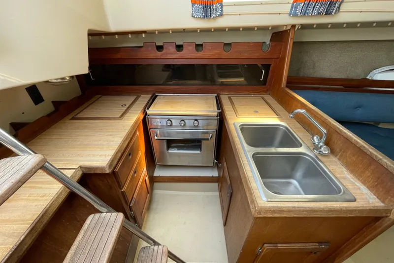 Slide: The Image of Bow of 1982 O'Day 34 sailboat with anchor mount and rigging. - 18