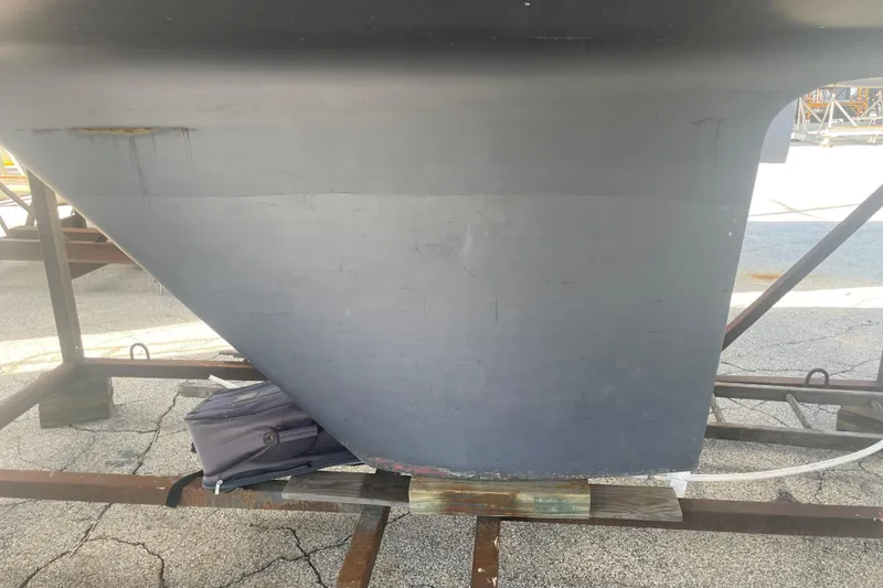 Slide: The Image of 1982 O'Day 34 sailboat in dry dock, Chicago, IL, with clear blue sky. - 4