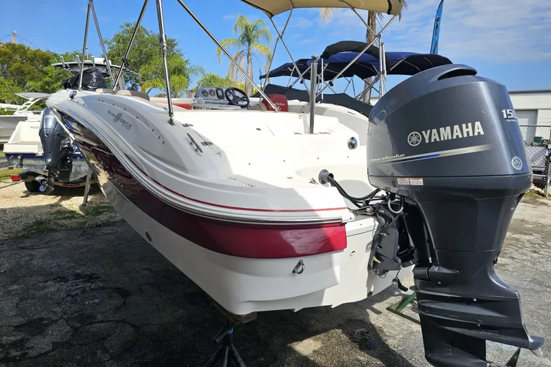 Slide: The Image of 2014 Hurricane SunDeck Sport 203 OB boat with Yamaha 150 outboard motor. - 1