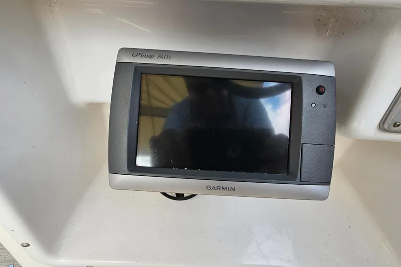 Slide: The Image of Garmin GPSmap 740s on 2014 Hurricane SunDeck Sport 203 OB boat dashboard. - 11