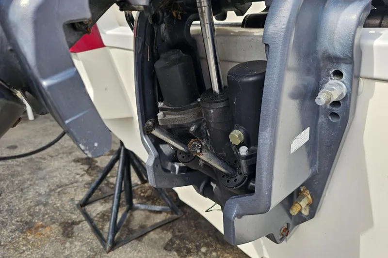 Slide: The Image of Close-up of a 2014 Hurricane SunDeck Sport 203 OB boat engine component. - 21