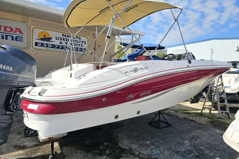 Slide: The Image of 2014 Hurricane SunDeck Sport 203 OB boat with canopy, displayed at Naples Used Boats. - 4