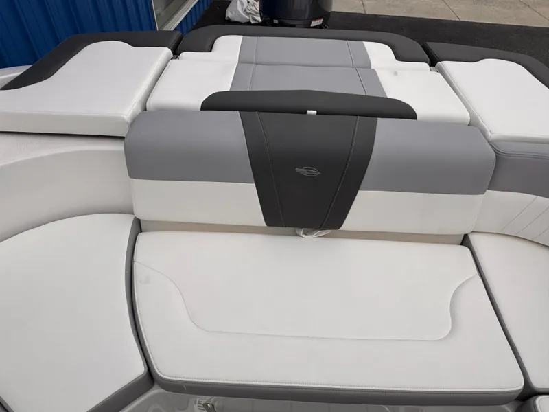 Slide: The Image of 2025 Chaparral 23 SSi OB boat interior with sleek, modern seating design. - 17