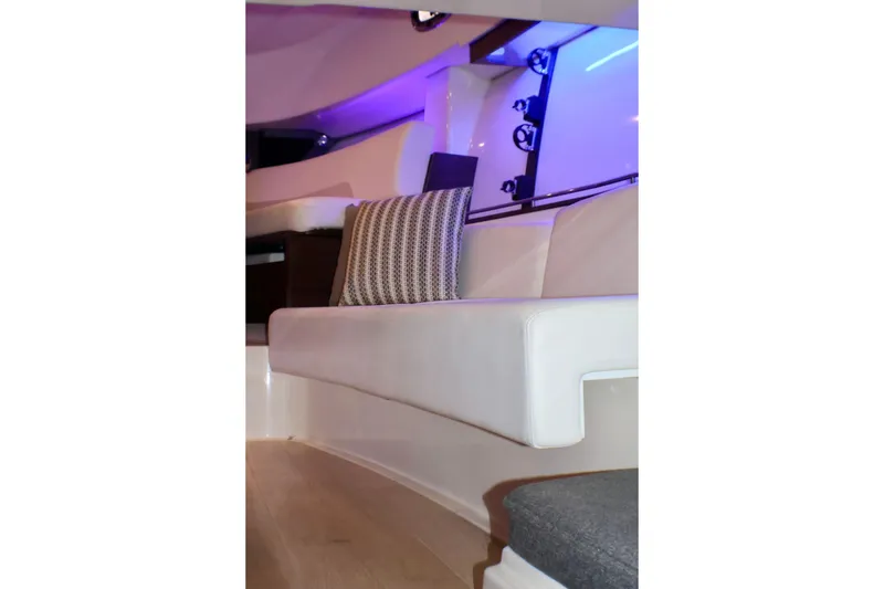 Slide: The Image of Interior of 2020 Boston Whaler 345 Conquest with modern seating and ambient lighting. - 18