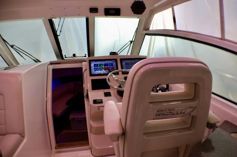 Slide: The Image of Cockpit of 2020 Boston Whaler 345 Conquest with modern navigation equipment. - 7