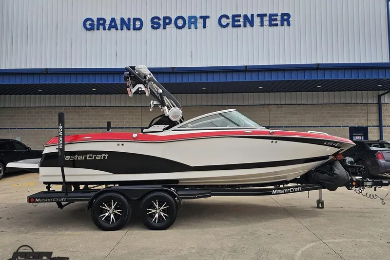 The Image of 2013 MasterCraft X-10 boat on trailer at Grand Sport Center. - 1