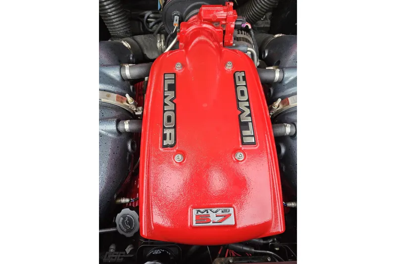 Slide: The Image of Red Ilmor MV8 5.7 engine in a 2013 MasterCraft X-10 boat. - 105