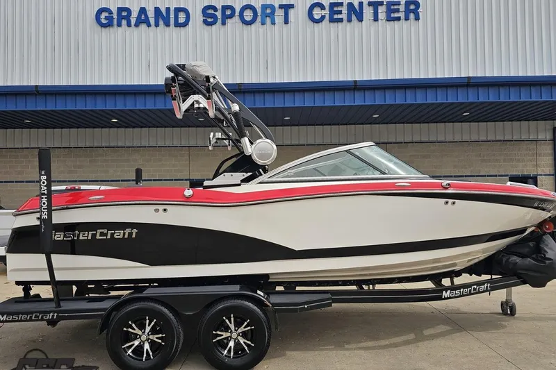 Slide: The Image of 2013 MasterCraft X-10 boat on trailer at Grand Sport Center. - 3