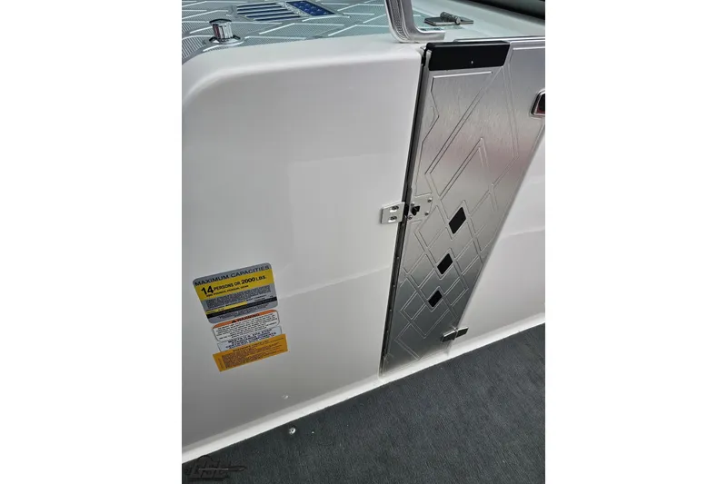 Slide: The Image of 2013 MasterCraft X-10 boat interior with capacity label and sleek design. - 71