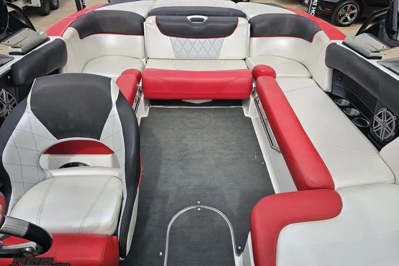 Slide: The Image of Interior of 2013 MasterCraft X-10 boat with red and white seating. - 87