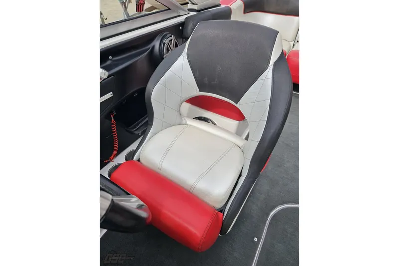 Slide: The Image of 2013 MasterCraft X-10 boat seat with red, white, and black upholstery. - 88