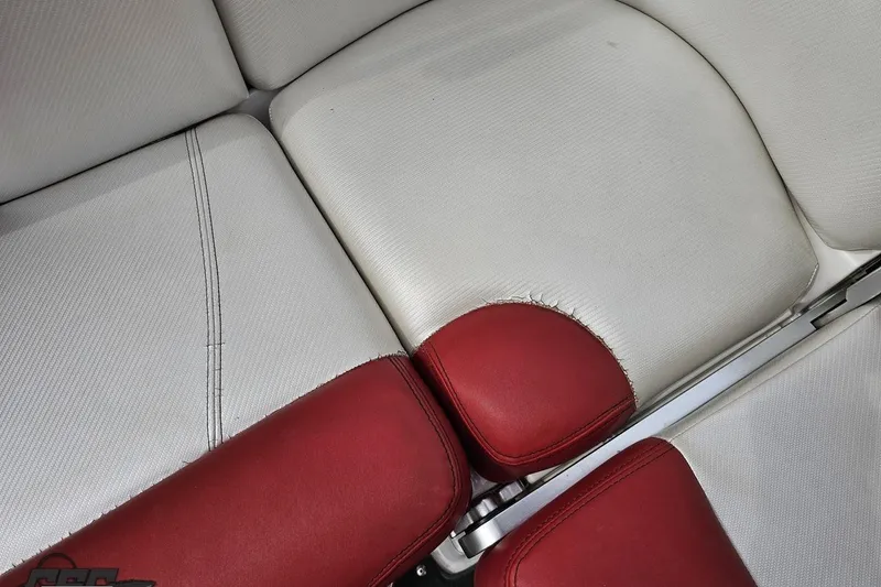 Slide: The Image of 2013 MasterCraft X-10 boat interior with white and red upholstery detail. - 94