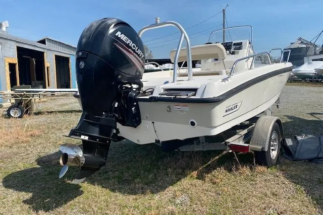 Slide: The Image of Boston Whaler 180 Dauntless 2017 boat dashboard with steering wheel and Raymarine electronics. - 4