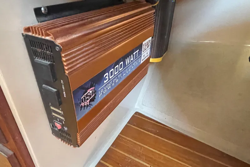 Slide: The Image of 3000-watt power inverter installed in a 1989 Catalina 36 sailboat interior. - 19