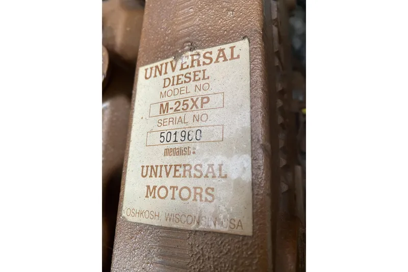 Slide: The Image of Label on Universal Diesel engine, model M-25XP, serial 501980, for Catalina 36, 1989. - 30