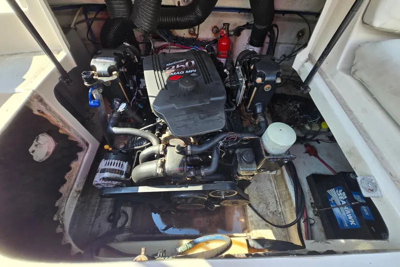 Slide: The Image of Engine compartment of a 2007 Sea Ray 240 Sundeck with MerCruiser 350 MAG MPI engine. - 22