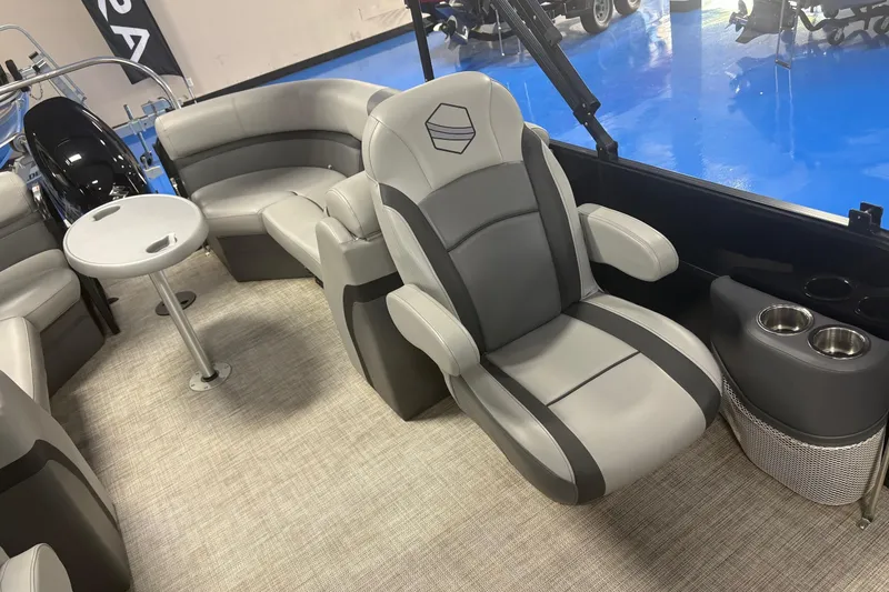 Slide: The Image of Luxurious interior of 2022 South Bay 224 RS 3.0 pontoon boat with plush seating. - 7