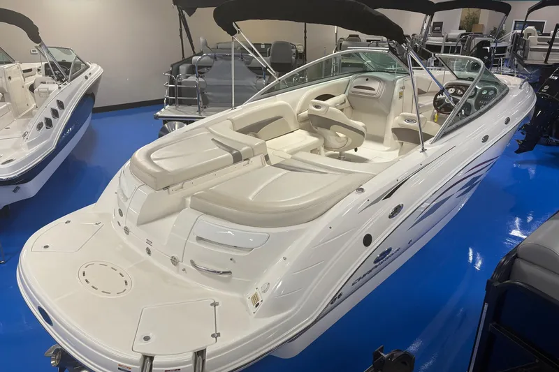 Slide: The Image of 2005 Chaparral 236 SSi boat with sleek design and spacious interior on display. - 2