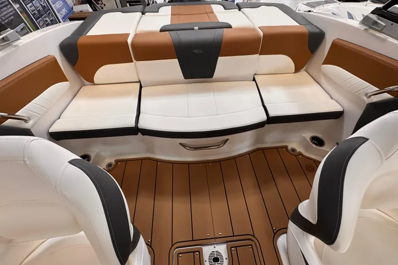 Slide: The Image of 2026 Chaparral 23 SSi OB boat interior at Cecil Marine dealership. - 10