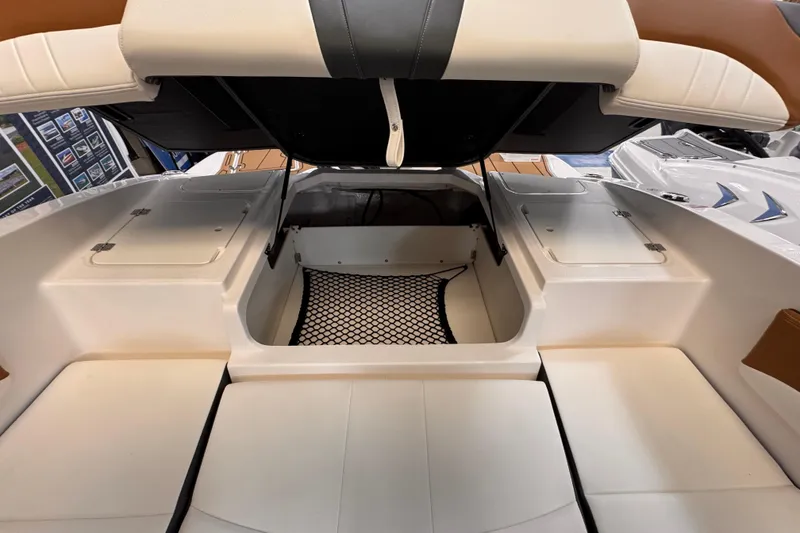 Slide: The Image of 2026 Chaparral 23 SSi OB boat interior with Simrad navigation system. - 11