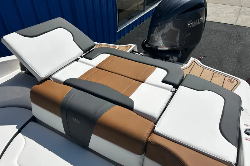 Slide: The Image of 2026 Chaparral 23 SSi OB boat with Yamaha outboard engine and stylish seating. - 24