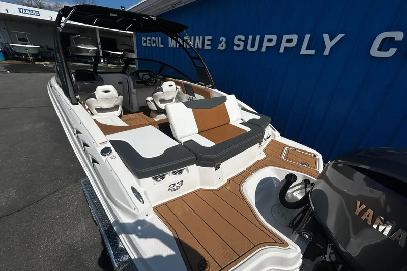 Slide: The Image of 2026 Chaparral 23 SSi OB boat with Yamaha engine at marine supply store. - 26