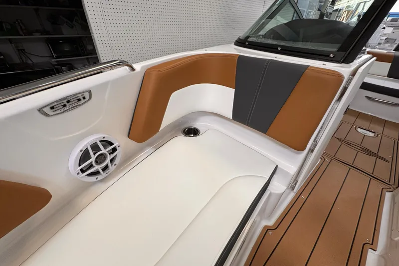 Slide: The Image of 2026 Chaparral 23 SSi OB boat with sleek design and spacious seating. - 4